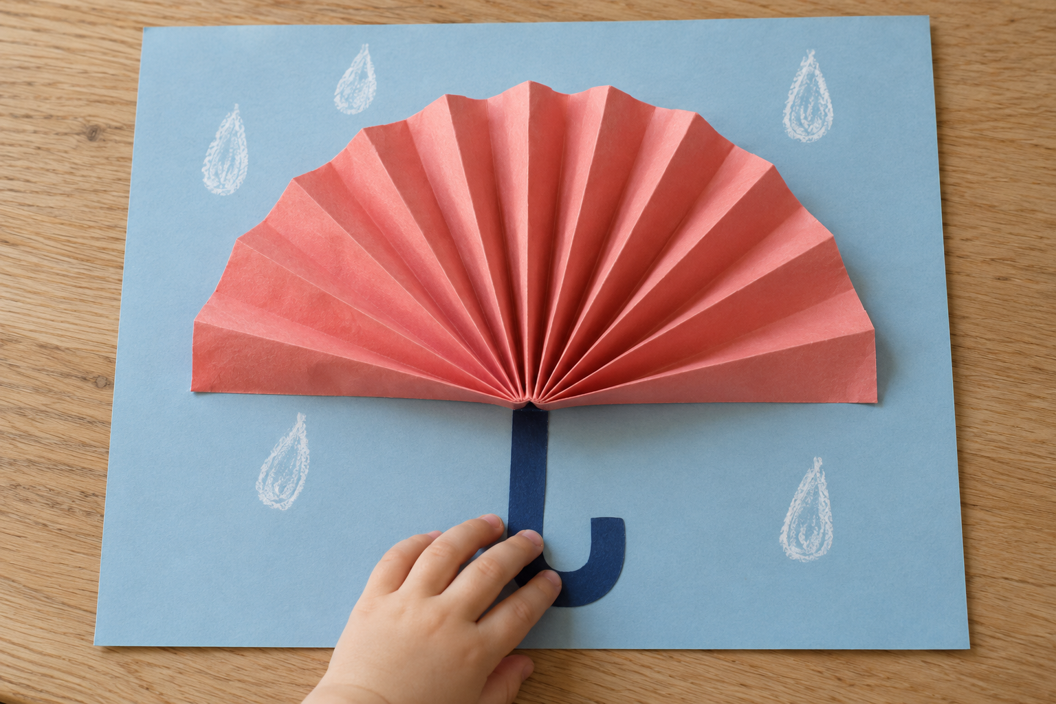 Toddler Umbrella Craft with an Accordion Paper Canopy
